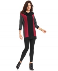 NY Collection's sweater is designed with a colorblocked knit and a flattering tunic silhouette. NY Collection's sweater is designed with a colorblocked knit and a flattering tunic silhouette.