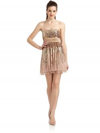 THE LOOKAllover sequinsStructured bodicePleated satin waistbandTulle skirtBack zip with hook-and-eye closureTHE FITAbout 24 from top to hemTHE MATERIALShell: polyesterSecond fabric: silkFully linedCARE & ORIGINDry cleanImportedModel shown is 5'10 (177cm) wearing US size 4. THE LOOKAllover sequinsStructured bodicePleated satin waistbandTulle skirtBack zip with hook-and-eye closureTHE FITAbout 24 from top to hemTHE MATERIALShell: polyesterSecond fabric: silkFully linedCARE & ORIGINDry cleanImportedModel shown is 5'10 (177cm) wearing US size 4.