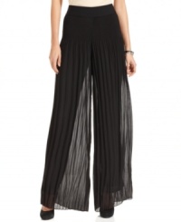 Alfani's palazzo pants feature a chic wide leg silhouette that's fully pleated for an elevated effect. Alfani's palazzo pants feature a chic wide leg silhouette that's fully pleated for an elevated effect.