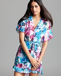 In Bloom's wrapper robe features an impressionistic floral print floating on lighter-than-air fabric. Mix with the coordinating chemise or your wardrobe of solids. In Bloom's wrapper robe features an impressionistic floral print floating on lighter-than-air fabric. Mix with the coordinating chemise or your wardrobe of solids.