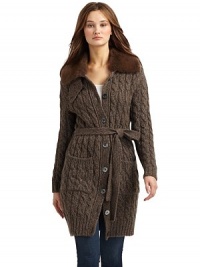 THE LOOKCable-knit design Fold-over collar with removable Mustela collar Front button closureLong ribbed cuff sleevesSelf-tie beltRibbed hemTHE FITAbout 38 from shoulder to hemTHE MATERIAL50% virgin wool/25% cashmere/25% angoraFur: mustelaCARE & ORIGINHand washImportedFur origin: FinlandModel shown is 5'10 (177cm) wearing US size Small. THE LOOKCable-knit design Fold-over collar with removable Mustela collar Front button closureLong ribbed cuff sleevesSelf-tie beltRibbed hemTHE FITAbout 38 from shoulder to hemTHE MATERIAL50% virgin wool/25% cashmere/25% angoraFur: mustelaCARE & ORIGINHand washImportedFur origin: FinlandModel shown is 5'10 (177cm) wearing US size Small.