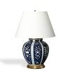 This lamp fashioned in porcelain with ornate pattern brings an elegant quality to any room.