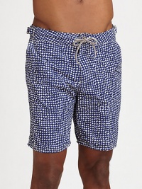 A printed summer favorite, in a longer silhouette, for the beach and beyond in smooth, quick-drying nylon.Drawstring waistSide slash, back welt pocketsInseam, about 7NylonMachine washImported A printed summer favorite, in a longer silhouette, for the beach and beyond in smooth, quick-drying nylon.Drawstring waistSide slash, back welt pocketsInseam, about 7NylonMachine washImported