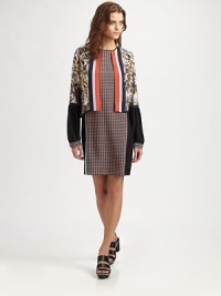 Trimmed with contrasting stripes and a floral print, this geometric-print dress has a jacket-like overlay that creates a layered look and a slightly opened back. RoundneckLong sleevesJacket-like overlayBack keyhole detail with button closurePolyesterDry cleanMade in USA of imported fabricModel shown is 5'10 (177cm) wearing US size Small. Trimmed with contrasting stripes and a floral print, this geometric-print dress has a jacket-like overlay that creates a layered look and a slightly opened back. RoundneckLong sleevesJacket-like overlayBack keyhole detail with button closurePolyesterDry cleanMade in USA of imported fabricModel shown is 5'10 (177cm) wearing US size Small.
