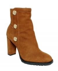 Golden logo buttons along the shaft of Isaac Mizrahi's Gabina booties create some serious eye-catching style. They also feature a flexible rubber sole for maximum traction and comfort. Golden logo buttons along the shaft of Isaac Mizrahi's Gabina booties create some serious eye-catching style. They also feature a flexible rubber sole for maximum traction and comfort.