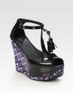 Chunky printed wedge with an adjustable t-strap, tassel laces and a slight peep toe. Self-covered wedge, 5 (125mm)Self-covered platform, 1½ (40mm)Compares to a 3½ heel (90mm)Rubber upperRubber lining and solePadded insoleImportedOUR FIT MODEL RECOMMENDS ordering one half size down as this style runs large. 