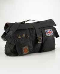 The iconic vintage motorcycle jacket is stylishly reincarnated as a sporty, patch-clad messenger bag, constructed with treated oilcloth for a waterproof finish. The iconic vintage motorcycle jacket is stylishly reincarnated as a sporty, patch-clad messenger bag, constructed with treated oilcloth for a waterproof finish.