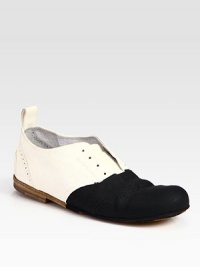 Back pull tab and laceless front restore this all-time leather favorite. Leather upperLeather lining and solePadded insoleMade in Italy Back pull tab and laceless front restore this all-time leather favorite. Leather upperLeather lining and solePadded insoleMade in Italy