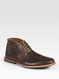 A clean and classic chukka design is pieced in supple leather with minimal detail and timeless appeal. Leather lining Padded insole Molded leather/rubber sole Imported A clean and classic chukka design is pieced in supple leather with minimal detail and timeless appeal. Leather lining Padded insole Molded leather/rubber sole Imported