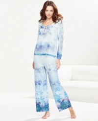 Embrace the lovely decorations of winter while staying warm and cozy in One World's Frozen Snowfall pajamas. Embrace the lovely decorations of winter while staying warm and cozy in One World's Frozen Snowfall pajamas.