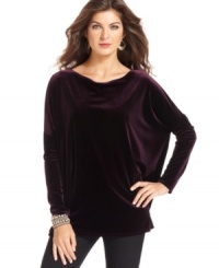 Add a luxe touch to autumn with Jones New York Signature's cozy velvet top. The boxy silhouette looks so sophisticated with skinny pants and pencil skirts! Add a luxe touch to autumn with Jones New York Signature's cozy velvet top. The boxy silhouette looks so sophisticated with skinny pants and pencil skirts!