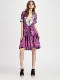 Distressed florals imbue this feminine frock with a contemporary edge while sequined trim amps up the glam factor.Deep V necklinePuffed sleevesWraparound self-beltRuffled hemAbout 25 from natural waistSilkDry cleanImportedModel shown is 5'10 (177cm) wearing US size Small. Distressed florals imbue this feminine frock with a contemporary edge while sequined trim amps up the glam factor.Deep V necklinePuffed sleevesWraparound self-beltRuffled hemAbout 25 from natural waistSilkDry cleanImportedModel shown is 5'10 (177cm) wearing US size Small.