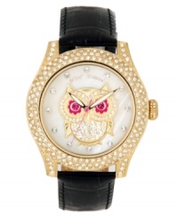 A wise choice for adding a touch of glitz to your everyday look. Watch by Betsey Johnson crafted of black leather strap and round polished gold tone stainless steel case covered in crystal accents. White mother-of-pearl dial features crystal accent markers, large gold tone owl with pink eyes and crystal accents, gold tone hour and minute hands, signature fuchsia second hand and logo. Quartz movement. Water resistant to 30 meters. Two-year limited warranty. Available exclusively at Macy's. A wise choice for adding a touch of glitz to your everyday look. Watch by Betsey Johnson crafted of black leather strap and round polished gold tone stainless steel case covered in crystal accents. White mother-of-pearl dial features crystal accent markers, large gold tone owl with pink eyes and crystal accents, gold tone hour and minute hands, signature fuchsia second hand and logo. Quartz movement. Water resistant to 30 meters. Two-year limited warranty. Available exclusively at Macy's.