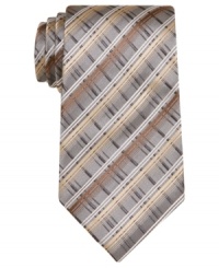 Get the skinny on the most modern way to wear your dress wardrobe: this skinny tie from Alfani RED locks down your look. Get the skinny on the most modern way to wear your dress wardrobe: this skinny tie from Alfani RED locks down your look.