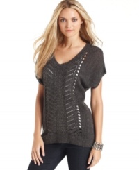 Layer up in this metallic-knit sweater from DKNY Jeans. Open-knit at the center front adds cozy texture - perfect layered with a tank top for fall days! Layer up in this metallic-knit sweater from DKNY Jeans. Open-knit at the center front adds cozy texture - perfect layered with a tank top for fall days!