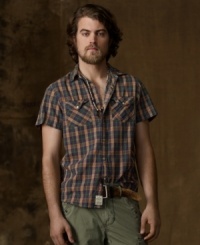 Channeling homespun style in softly textured woven cotton, a short-sleeved Western shirt in rugged plaid gives off an effortless, laid-back vibe. Channeling homespun style in softly textured woven cotton, a short-sleeved Western shirt in rugged plaid gives off an effortless, laid-back vibe.