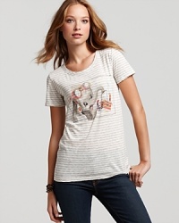 Dumbo arrives on this striped Patterson J. Kincaid tee, adorable for the weekends with your favorite denim. Layer it under a cardi for a cozy fall and flaunt dynamic Disney style. Dumbo arrives on this striped Patterson J. Kincaid tee, adorable for the weekends with your favorite denim. Layer it under a cardi for a cozy fall and flaunt dynamic Disney style.