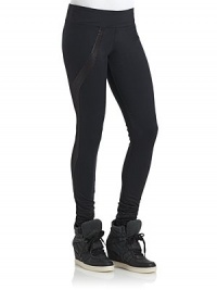 THE LOOKWide elastic waistbandTonal geometric appliqué at one legTopstitch detailsRuched cuffs with zip closuresTHE FITRise, about 8Inseam, about 22THE MATERIALNylon/Lycra spandexAppliqué: polyester/spandexCARE & ORIGINMachine washImportedModel shown is 5'8 (172½cm) wearing US size Small. THE LOOKWide elastic waistbandTonal geometric appliqué at one legTopstitch detailsRuched cuffs with zip closuresTHE FITRise, about 8Inseam, about 22THE MATERIALNylon/Lycra spandexAppliqué: polyester/spandexCARE & ORIGINMachine washImportedModel shown is 5'8 (172½cm) wearing US size Small.