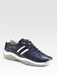 Clean, sporty design with contrast leather detail.Leather upperPadded insoleRubber soleImported Clean, sporty design with contrast leather detail.Leather upperPadded insoleRubber soleImported