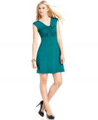 Elegant draping adds a glamorous appeal to this petite jersey dress from Spense -- a perfect choice for dinner and drinks! Elegant draping adds a glamorous appeal to this petite jersey dress from Spense -- a perfect choice for dinner and drinks!