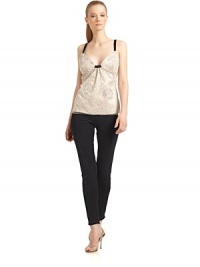 THE LOOKSheer tulle overlay with floral beadworkContrasting satin shoulder strapsContour cups with underwireSide zipperBack satin straps with cutout detailsTHE FITAbout 26 from shoulder to hemTHE MATERIALPolyamideFabric 2: 55% silk/45% nylonFully linedCARE & ORIGINDry cleanMade in ItalyModel shown is 5'10½ (179cm) wearing US size 2. THE LOOKSheer tulle overlay with floral beadworkContrasting satin shoulder strapsContour cups with underwireSide zipperBack satin straps with cutout detailsTHE FITAbout 26 from shoulder to hemTHE MATERIALPolyamideFabric 2: 55% silk/45% nylonFully linedCARE & ORIGINDry cleanMade in ItalyModel shown is 5'10½ (179cm) wearing US size 2.