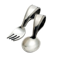 With an intricate bead design, the Baby Beads 2-Piece Baby Set from Reed & Barton is the perfect gift for both boys and girls. This non-tarnish bright pewter baby flatware set includes a spoon and a fork specially crafted for small hands. With an intricate bead design, the Baby Beads 2-Piece Baby Set from Reed & Barton is the perfect gift for both boys and girls. This non-tarnish bright pewter baby flatware set includes a spoon and a fork specially crafted for small hands.