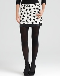 Black and white and chic all over, this DIANE von FURSTENBERG skirt is the it mini of the season thanks to the unexpected leather hem and bold canvas print. Black and white and chic all over, this DIANE von FURSTENBERG skirt is the it mini of the season thanks to the unexpected leather hem and bold canvas print.