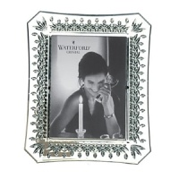 There's no more special way to display a treasured photograph than with this classic frame from the Lismore collection. Wedge cuts and leaf patterns make up the unforgettable design on the edges. There's no more special way to display a treasured photograph than with this classic frame from the Lismore collection. Wedge cuts and leaf patterns make up the unforgettable design on the edges.