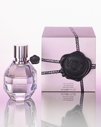 FLOWERBOMB is a floral explosion, a profusion of flowers that has the power to make everything seem more positive. Magically evocative notes will immediately awaken your deepest senses, giving you the impression of living life in your own secret garden away from reality. FLOWERBOMB is a floral explosion, a profusion of flowers that has the power to make everything seem more positive. Magically evocative notes will immediately awaken your deepest senses, giving you the impression of living life in your own secret garden away from reality.