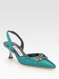 Crystal-encrusted point toe slingback of luxe satin, with a sparkling jeweled embellishment. Self-covered heel, 2½ (65mm)Satin upper with a jeweled-detail and crystalsPoint toeElasticized slingback strapLeather lining and solePadded insoleMade in ItalyOUR FIT MODEL RECOMMENDS ordering one half size up as this style runs small. Crystal-encrusted point toe slingback of luxe satin, with a sparkling jeweled embellishment. Self-covered heel, 2½ (65mm)Satin upper with a jeweled-detail and crystalsPoint toeElasticized slingback strapLeather lining and solePadded insoleMade in ItalyOUR FIT MODEL RECOMMENDS ordering one half size up as this style runs small.