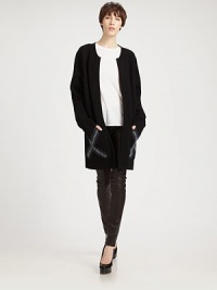 This plush knit style features a long, cozy silhouette and embroidered details on each pocket.Jewel necklineOpen frontLong sleevesPatch pocketsAbout 42 from shoulder to hem74% wool/26% polyesterDry cleanMade in ItalyModel shown is 5'10 (177cm) wearing US size Small. This plush knit style features a long, cozy silhouette and embroidered details on each pocket.Jewel necklineOpen frontLong sleevesPatch pocketsAbout 42 from shoulder to hem74% wool/26% polyesterDry cleanMade in ItalyModel shown is 5'10 (177cm) wearing US size Small.