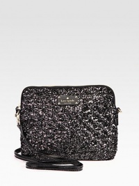 Let your tech sparkle in this sequined style with patent leather trim and a logo emblem.Detachable patent leather shoulder strap, 22 dropTop zip closureOne outside zip pocketOne inside open pocketCotton lining10W X 8½H X 1DImportedPlease note: iPad® not included. Let your tech sparkle in this sequined style with patent leather trim and a logo emblem.Detachable patent leather shoulder strap, 22 dropTop zip closureOne outside zip pocketOne inside open pocketCotton lining10W X 8½H X 1DImportedPlease note: iPad® not included.