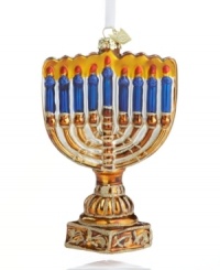 Light the candle and trim the tree. The glass menorah ornament from Kurt Adler brings festive new flair to any and every celebration. Light the candle and trim the tree. The glass menorah ornament from Kurt Adler brings festive new flair to any and every celebration.