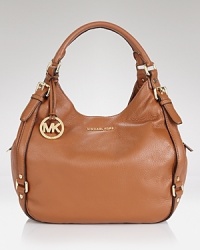 An essential shoulder bag from MICHAEL Michael Kors in goes-with-everything python leather. An essential shoulder bag from MICHAEL Michael Kors in goes-with-everything python leather.