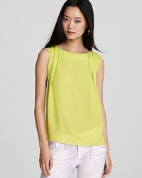Pretty pleats elevate this Alice + Olivia Gladys tee to a level of high-style, while an exposed back zipper adds the slightest hint of edge. Pretty pleats elevate this Alice + Olivia Gladys tee to a level of high-style, while an exposed back zipper adds the slightest hint of edge.
