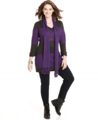 Stripes are a must-get this season, so score Extra Touch's plus size tunic sweater! Stripes are a must-get this season, so score Extra Touch's plus size tunic sweater!