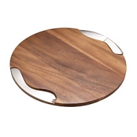 Making a contemporary statement when it goes around the table or graces a buffet, this circular cheese block of warm acacia wood features lustrous stainless-steel inset accents that offer an artistic contrast with additional functionality as the knife and spreader. The stainless-steel knife and spreader accompanying the cheese block echoes the theme with an acacia accent. Designer Neil Cohen uses acacia, a dense, durable hardwood, not only for the beauty of its finely patterned grain of varying shades but for its practicality. Being naturally resinous, acacia will not absorb stains or cheese odors. The block can be hand washed with warm soapy water. Because the knife and spreader made of 18/10 stainless steal and are rust-resistant they are considered dishwasher safe. Making a contemporary statement when it goes around the table or graces a buffet, this circular cheese block of warm acacia wood features lustrous stainless-steel inset accents that offer an artistic contrast with additional functionality as the knife and spreader. The stainless-steel knife and spreader accompanying the cheese block echoes the theme with an acacia accent. Designer Neil Cohen uses acacia, a dense, durable hardwood, not only for the beauty of its finely patterned grain of varying shades but for its practicality. Being naturally resinous, acacia will not absorb stains or cheese odors. The block can be hand washed with warm soapy water. Because the knife and spreader made of 18/10 stainless steal and are rust-resistant they are considered dishwasher safe.