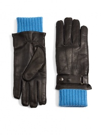 THE LOOKPerforated leatherRibbed knit glove liningSnap detail at cuffsTHE MATERIALBody: leatherLining: cashmere/extrafine wool/silkCARE & ORIGINDry cleanImported THE LOOKPerforated leatherRibbed knit glove liningSnap detail at cuffsTHE MATERIALBody: leatherLining: cashmere/extrafine wool/silkCARE & ORIGINDry cleanImported