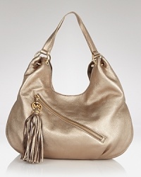 Highlight your daytime look with this leather tote from MICHAEL Michael Kors. It's utterly effortless, simply slip your essentials inside for definitive daytime style. Highlight your daytime look with this leather tote from MICHAEL Michael Kors. It's utterly effortless, simply slip your essentials inside for definitive daytime style.