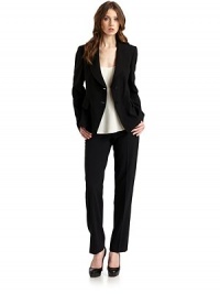 THE LOOKPeaked lapelTwo-button front with logo-embossed buttonsLong sleevesDual front flap pocketsAngled seams, front and backCenter ventTHE FITAbout 26 from shoulder to hemTHE MATERIALVirgin woolCupro liningCARE & ORIGINDry cleanMade in ItalyModel shown is 5'9½ (176cm) wearing US size 4. THE LOOKPeaked lapelTwo-button front with logo-embossed buttonsLong sleevesDual front flap pocketsAngled seams, front and backCenter ventTHE FITAbout 26 from shoulder to hemTHE MATERIALVirgin woolCupro liningCARE & ORIGINDry cleanMade in ItalyModel shown is 5'9½ (176cm) wearing US size 4.