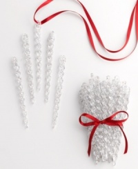 Frozen in time, these twirling icicles add a drop of winter's beauty to your tree. A set of 40, in sparkling clear or gold, transform the indoors into a frosty wonderland. Frozen in time, these twirling icicles add a drop of winter's beauty to your tree. A set of 40, in sparkling clear or gold, transform the indoors into a frosty wonderland.
