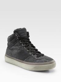 High-top lace-up trainers are crafted in a substantial wool/cashmere flannel with soft shearling lining for a warm, winter-ready fit. Leather lining Rubber sole Made in Italy High-top lace-up trainers are crafted in a substantial wool/cashmere flannel with soft shearling lining for a warm, winter-ready fit. Leather lining Rubber sole Made in Italy