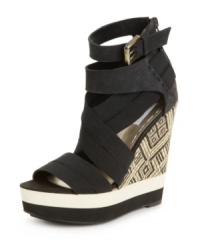 Stretch your look to new heights this season with the Jenell sandals by RACHEL Rachel Roy. Stretchy elastic and leather straps zip up at the back and set atop an outrageous platform wedge heel. Stretch your look to new heights this season with the Jenell sandals by RACHEL Rachel Roy. Stretchy elastic and leather straps zip up at the back and set atop an outrageous platform wedge heel.