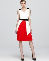Intricate pleats and bold color-blocking make this Trina Turk dress a standout addition to your office-to-evening dress collection. Intricate pleats and bold color-blocking make this Trina Turk dress a standout addition to your office-to-evening dress collection.