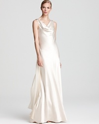 Gilded embellishments and chain details lend edge to a graceful, cowl neck gown from ABS by Allen Schwartz. Gilded embellishments and chain details lend edge to a graceful, cowl neck gown from ABS by Allen Schwartz.