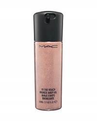 Glamorous sun effects in a shimmering body oil for a sheer sheen and a sexy bronzed-up gleam. Features three natural botanical oils to help soften, smooth, soothe and moisturize skin. Limited edition. Glamorous sun effects in a shimmering body oil for a sheer sheen and a sexy bronzed-up gleam. Features three natural botanical oils to help soften, smooth, soothe and moisturize skin. Limited edition.