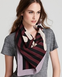 SONIA RYKIEL's script signature is emblazoned across the middle of this striped scarf from the French designer. SONIA RYKIEL's script signature is emblazoned across the middle of this striped scarf from the French designer.