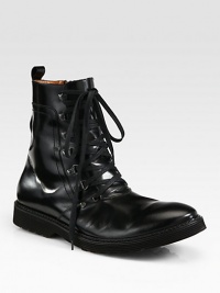 Lace-up ankle boot flawlessly crafted in smooth, sleek Italian leather, completed with a comfortable rubber sole.Leather upperLeather liningPadded insoleRubber soleMade in Italy Lace-up ankle boot flawlessly crafted in smooth, sleek Italian leather, completed with a comfortable rubber sole.Leather upperLeather liningPadded insoleRubber soleMade in Italy