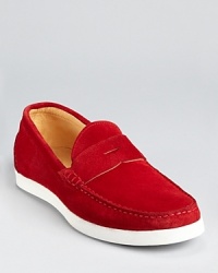 Penny loafers rendered in quality suede and updated with modern, sporty details for a wear-anywhere casual shoe. Penny loafers rendered in quality suede and updated with modern, sporty details for a wear-anywhere casual shoe.