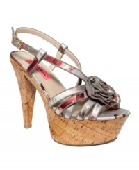 Chunky and femme! Between the girly height, the pretty floral pattern, and rosette detail you can't help but steal the show in the Circle platform sandals by Betsey Johnson. Chunky and femme! Between the girly height, the pretty floral pattern, and rosette detail you can't help but steal the show in the Circle platform sandals by Betsey Johnson.